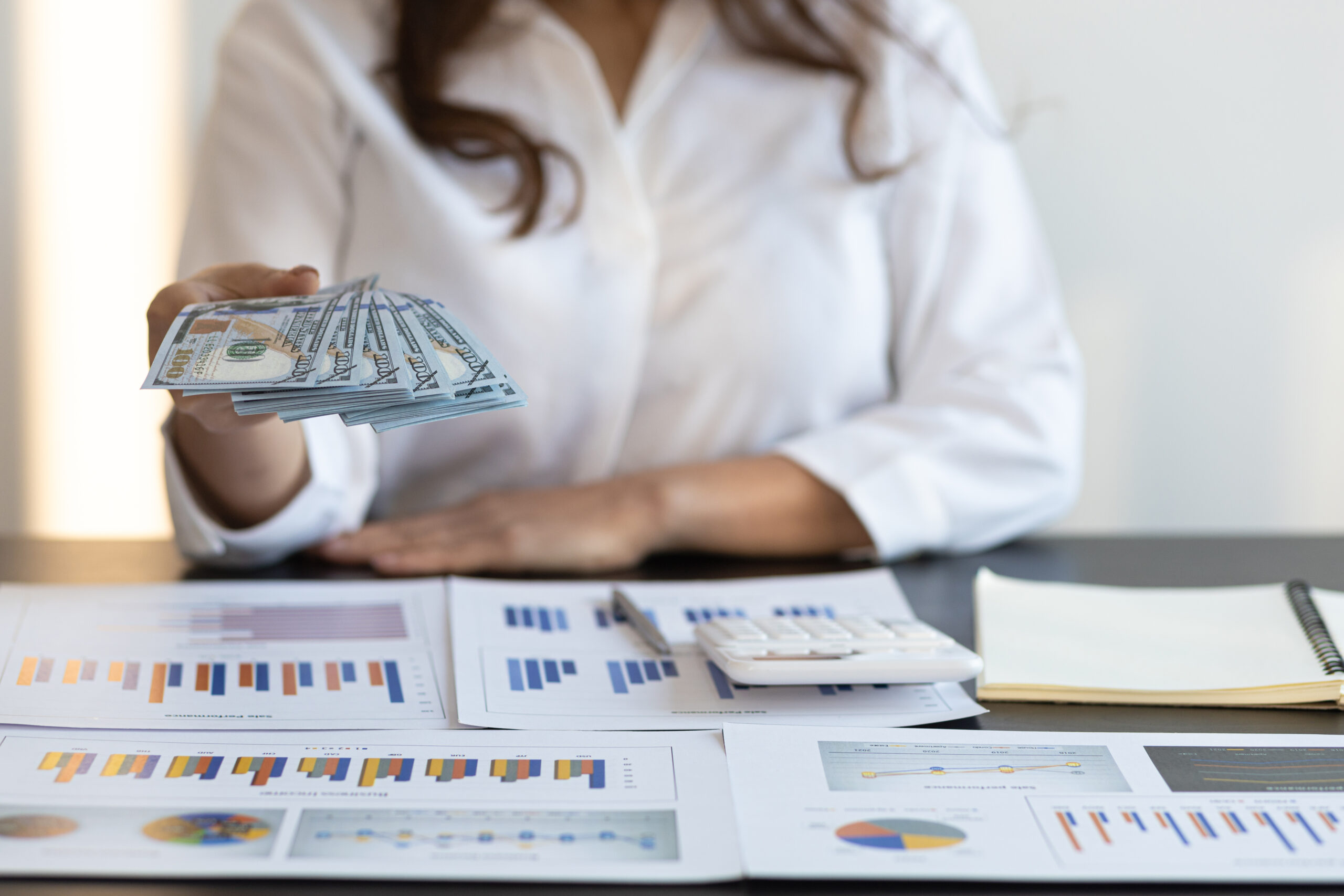 woman-holding-money-and-banknotes-cash-is-offerin-2023-11-27-05-04-09-utc CX Call Center Outsourcing Services | CX Solutions | TeleData Select